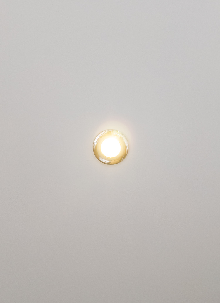 A photo of an LED bulb giving off a warm glow