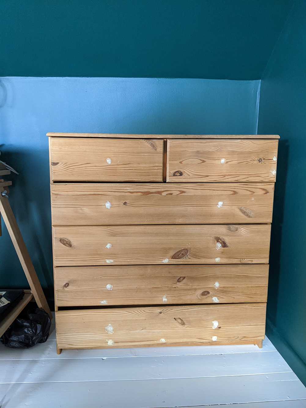 A photo of the chest of drawers before they were painted.