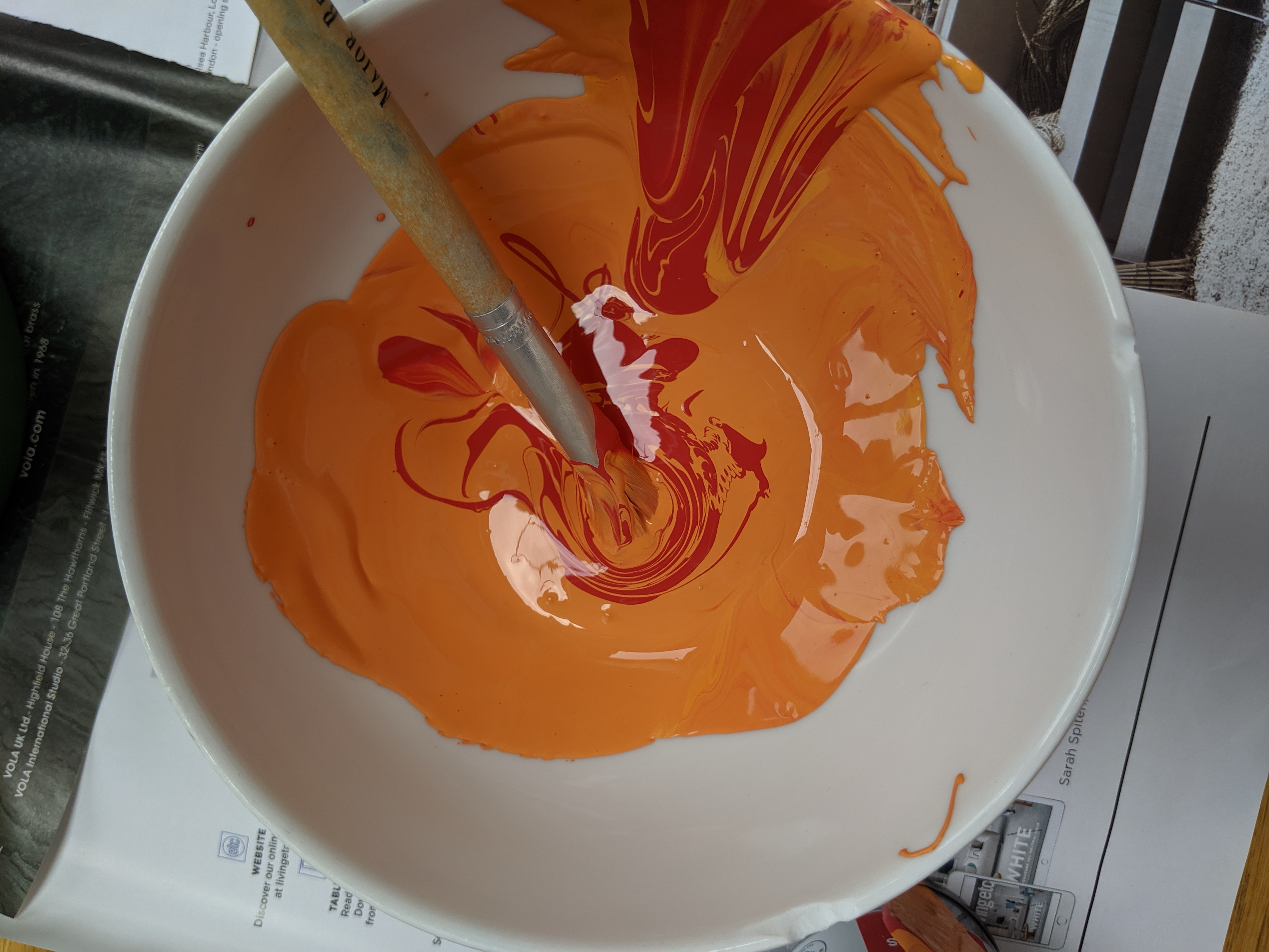 A photo of the colours being mixed together.