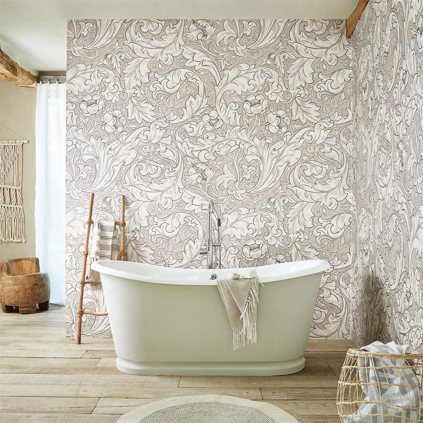a pale grey wallpaper design called 'Bachelor's Button' behind a pale green bath tub 