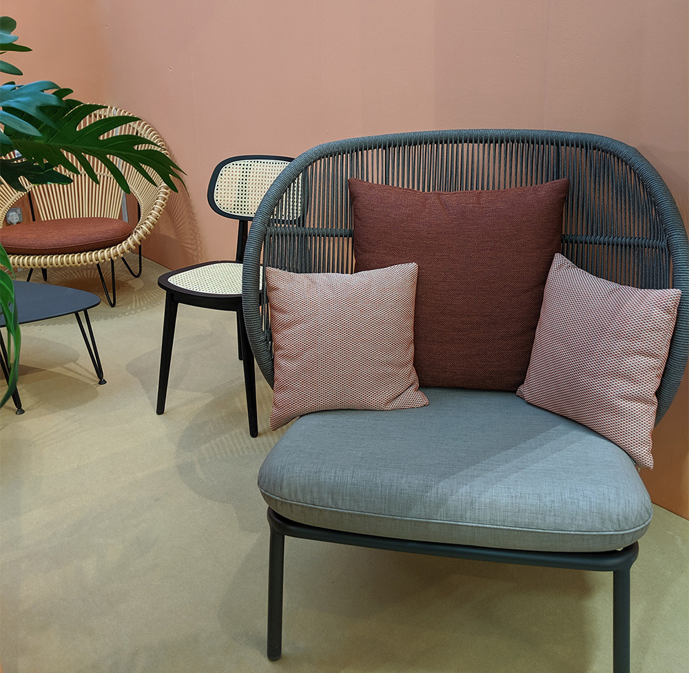 A photo of a rattan dining chair at the Decorex Trade Fair 2019