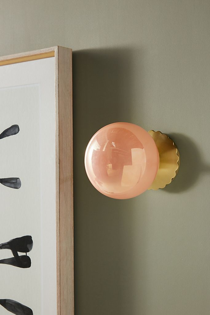 A photo of the new peach wall light.