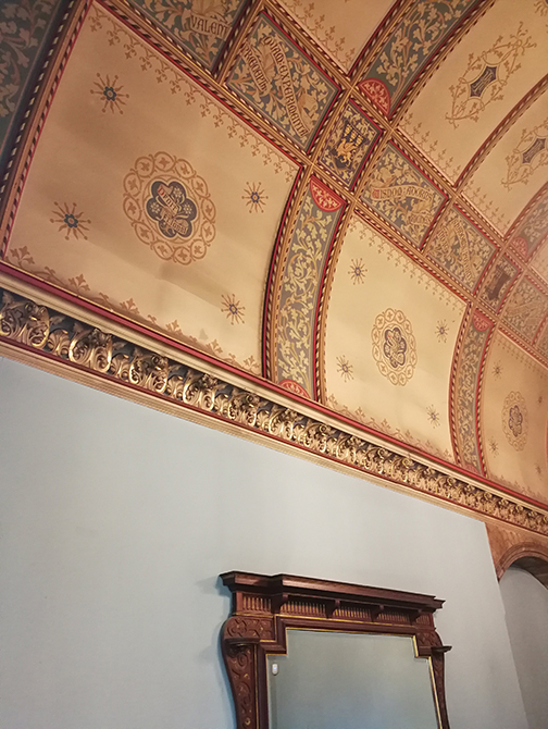 A photo of the decorated ceiling at Insole Court