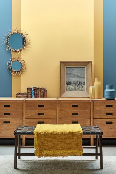 A photo for Little Greene with room inspiration for using Carys yellow paint.