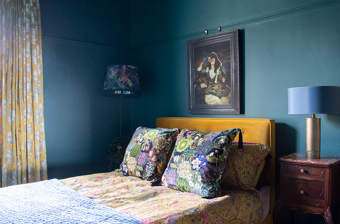 A photo of our Quirky Victorian House project, with an antique bedside table.