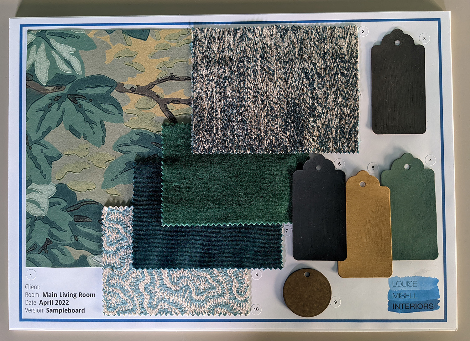 A photo of the finished sample board for my client's living room.