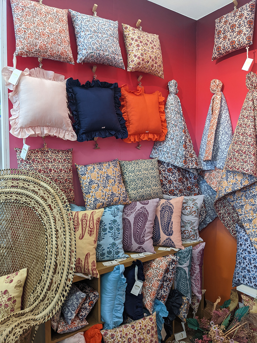 A photo of the frilled cushions on the Daughters of Gaea stand.