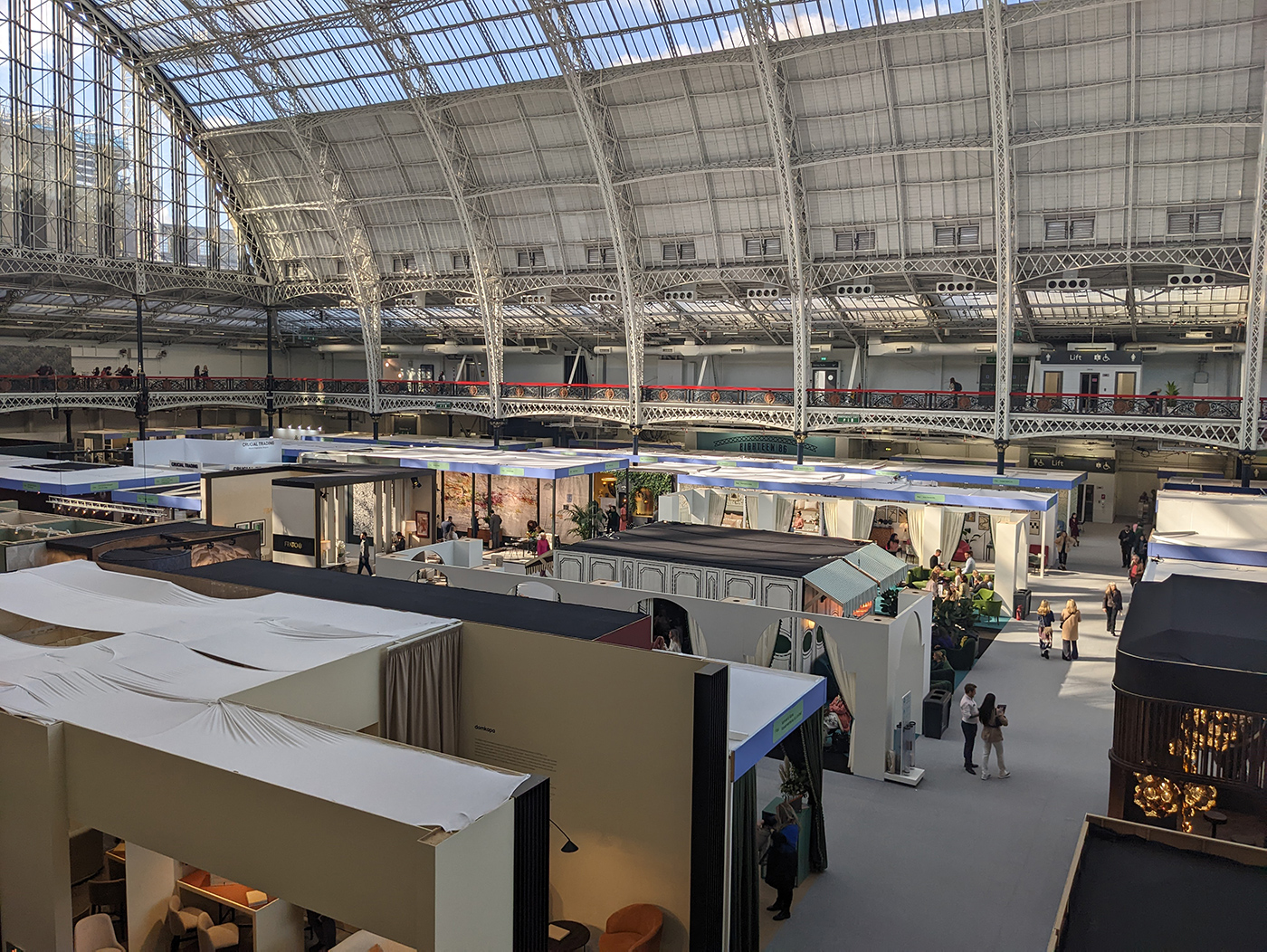 A photo of the great hall at the Olympia exhibition centre, showing the roof structure.