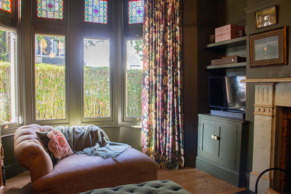 A photo of one of our projects with the TV placed in the alcove next to the chimney breast.