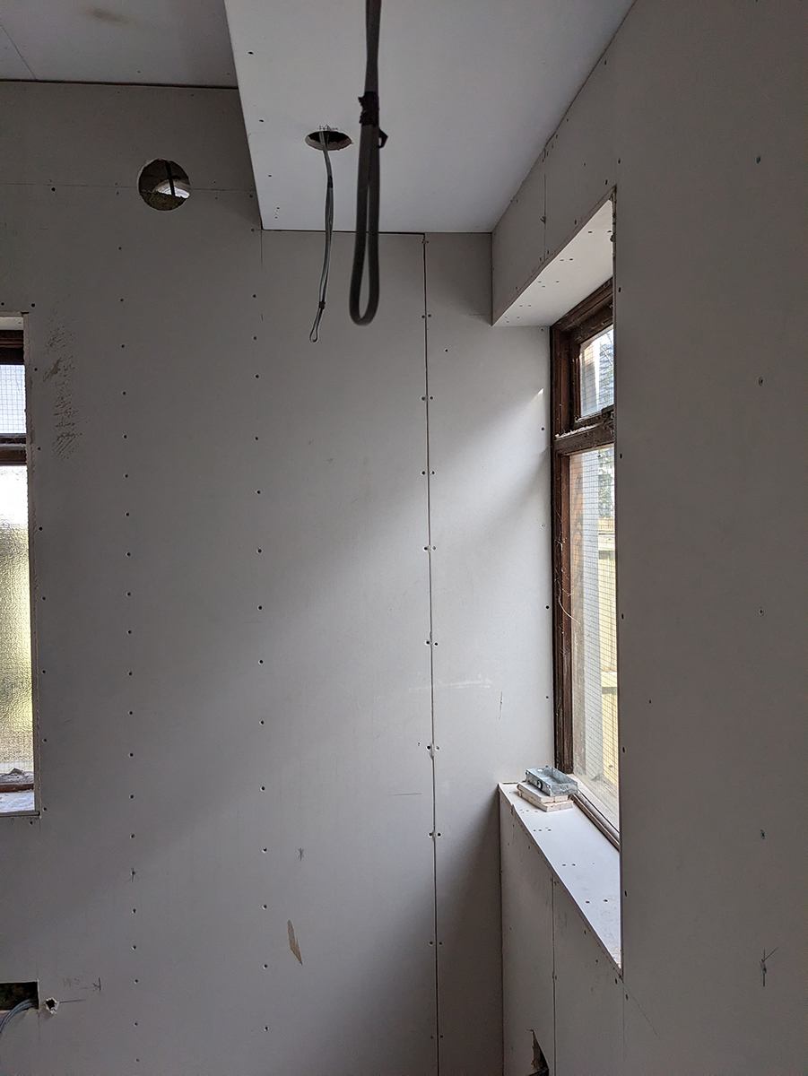 An in progress photo of the window area when the cables and plaster boarding were done.