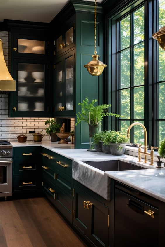An image from Pinterest of a green traditional kitchen with marble worktops