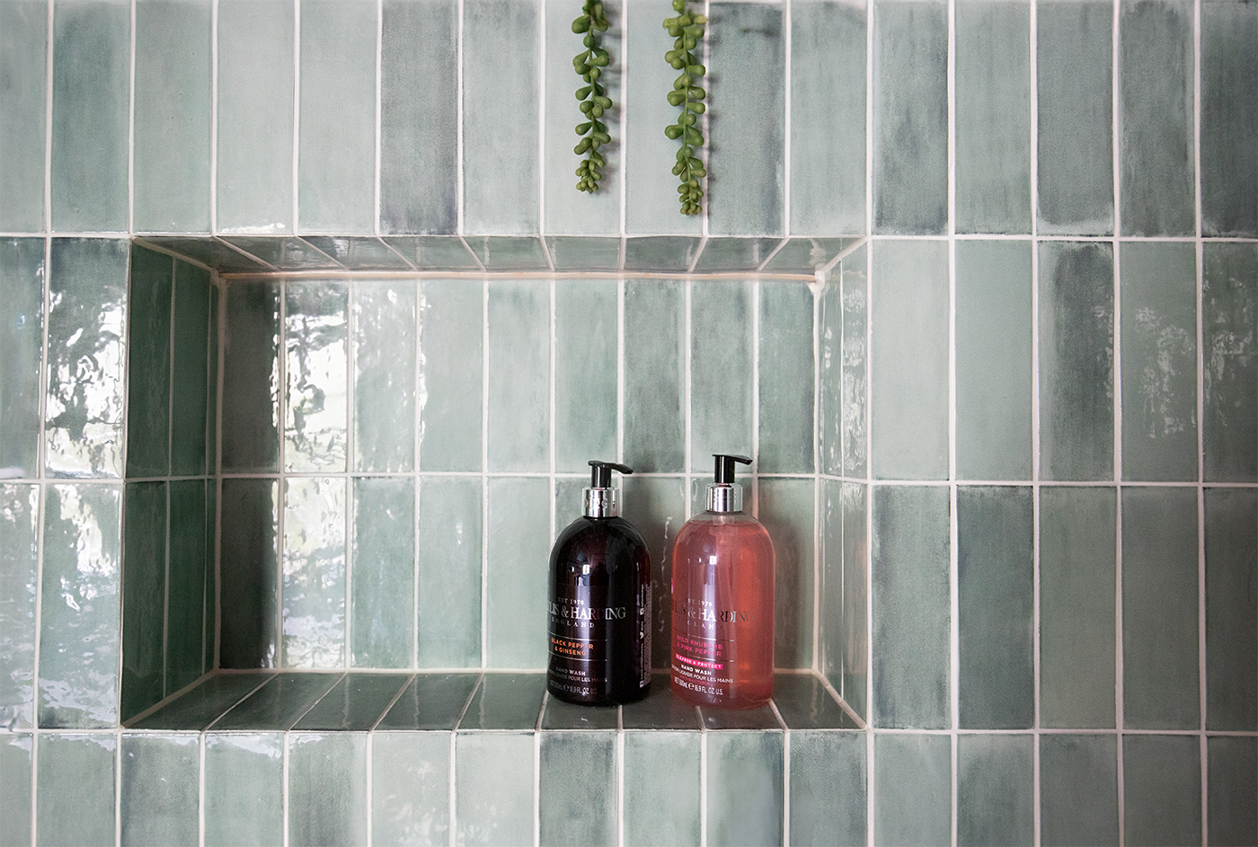 A close up photo of the mitred tiles in the shower niches.