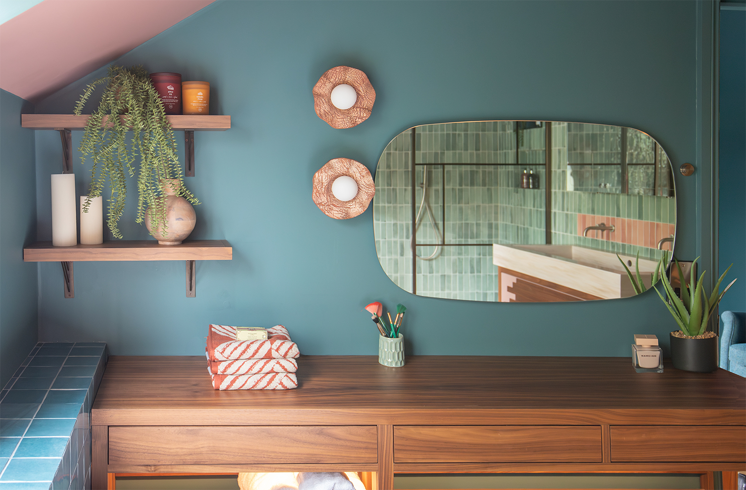 A photo of the walnut dressing table with the mirror and two shelves above.