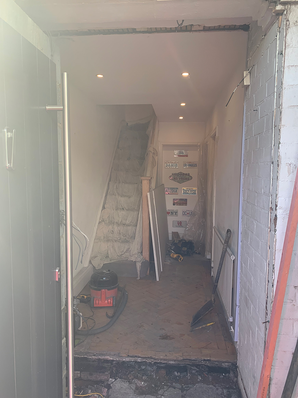 A hallway undergoing building work 