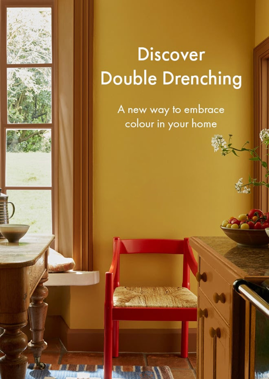 A photo from Little Greene of a room double drenched in yellow and mustard.