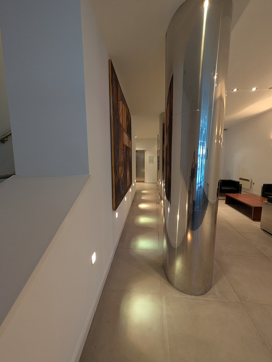 A before photo showing the narrow space behind the pillars.
