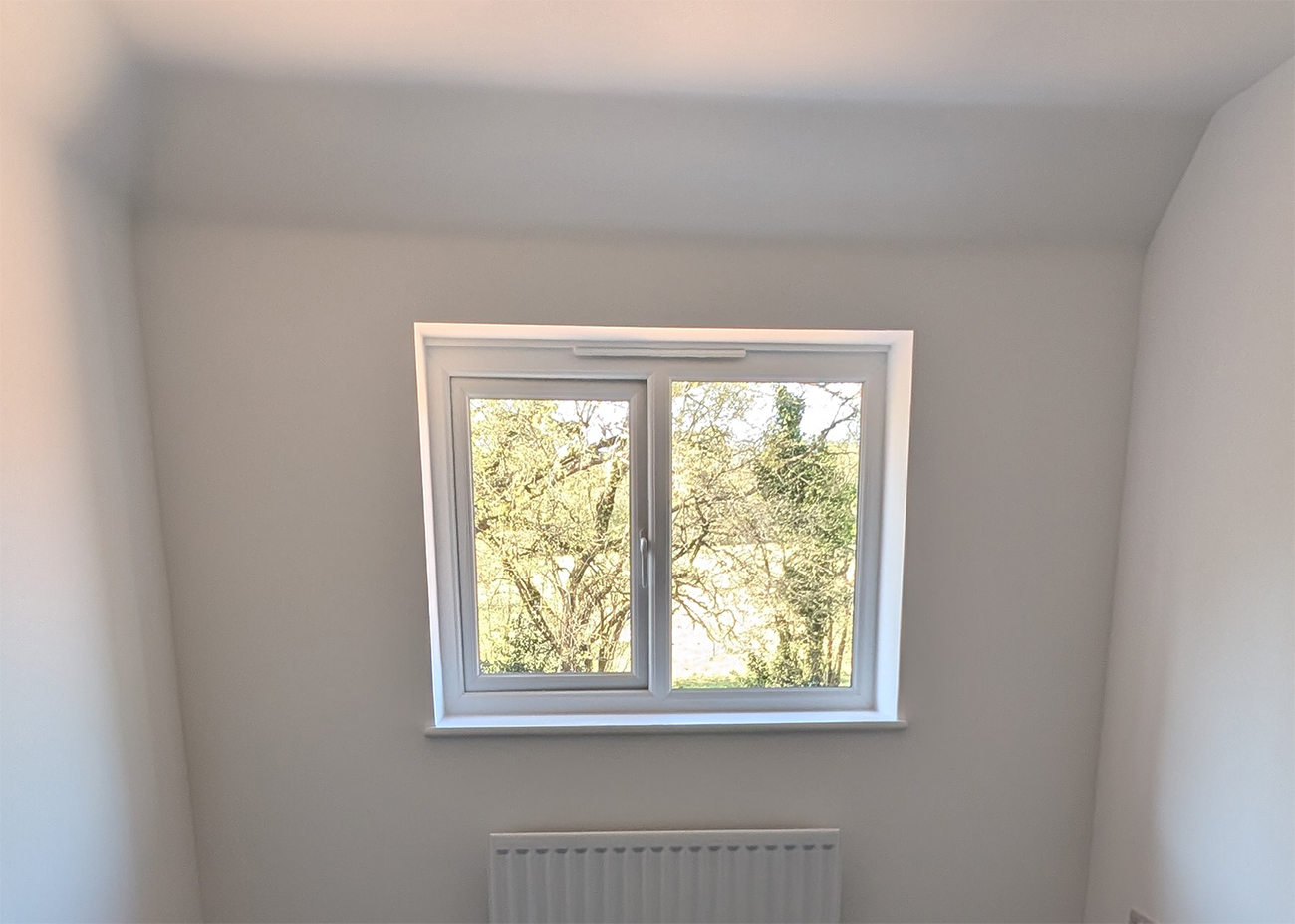 A new build home office with white walls