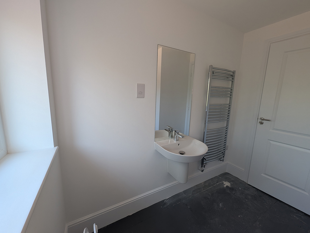 A new build bathroom with no storage