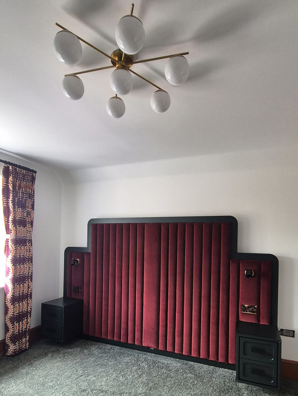 A new build bedroom with bespoke headboard