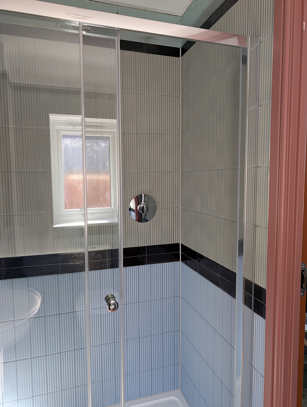 A new build en suite with colourful tiles