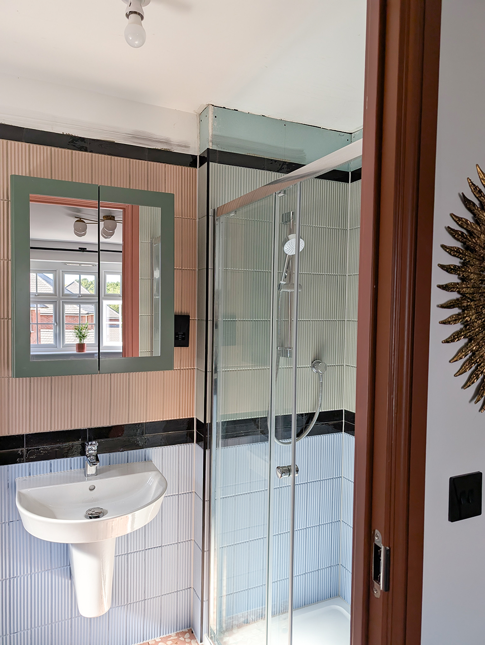 A new build en suite with colourful tiles