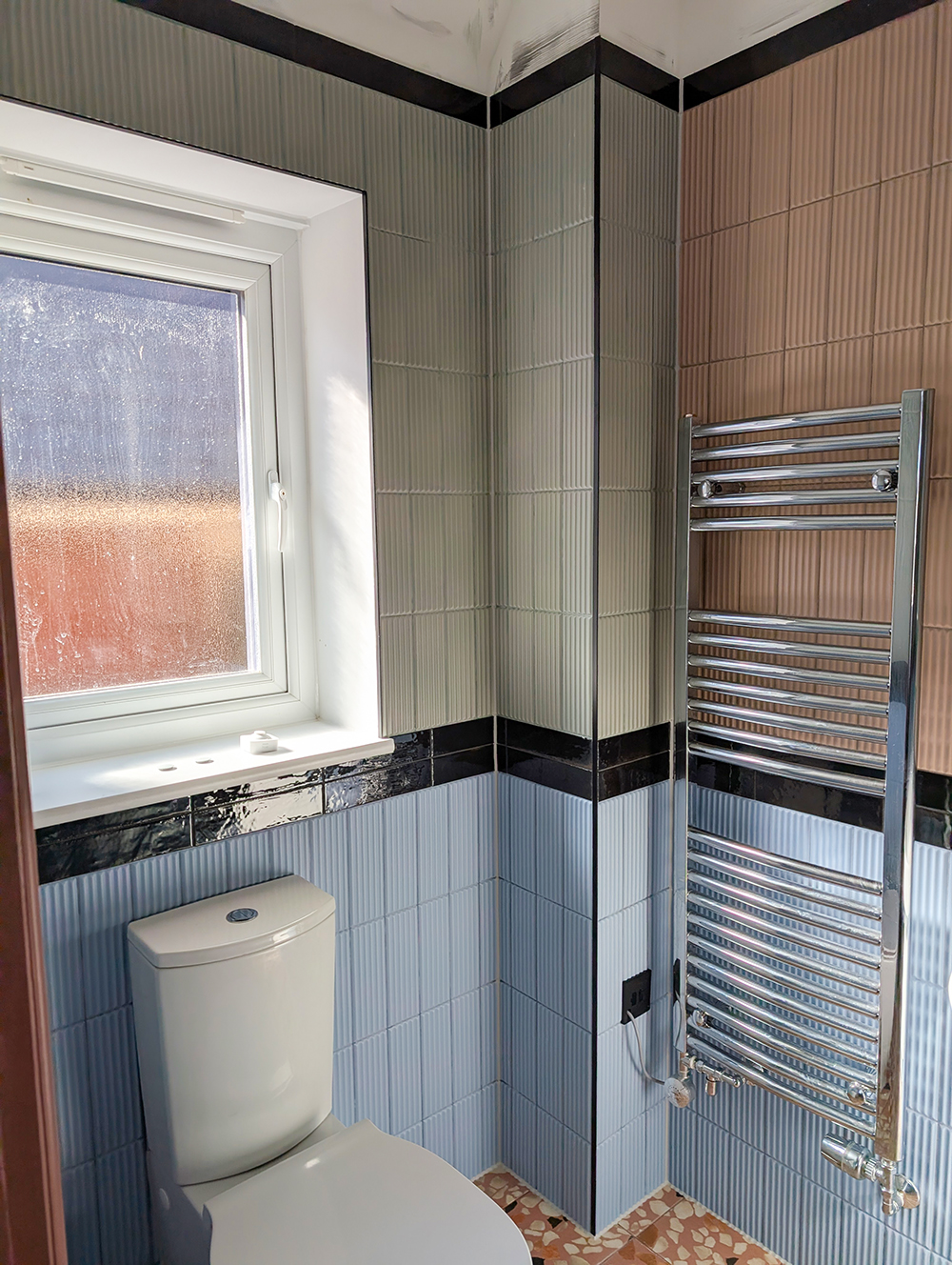 A new build en suite with colourful tiles
