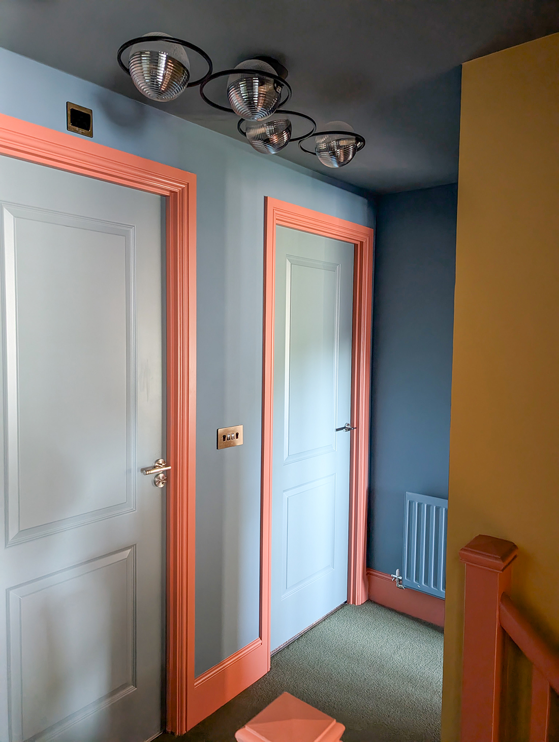 A new build landing with colourful walls