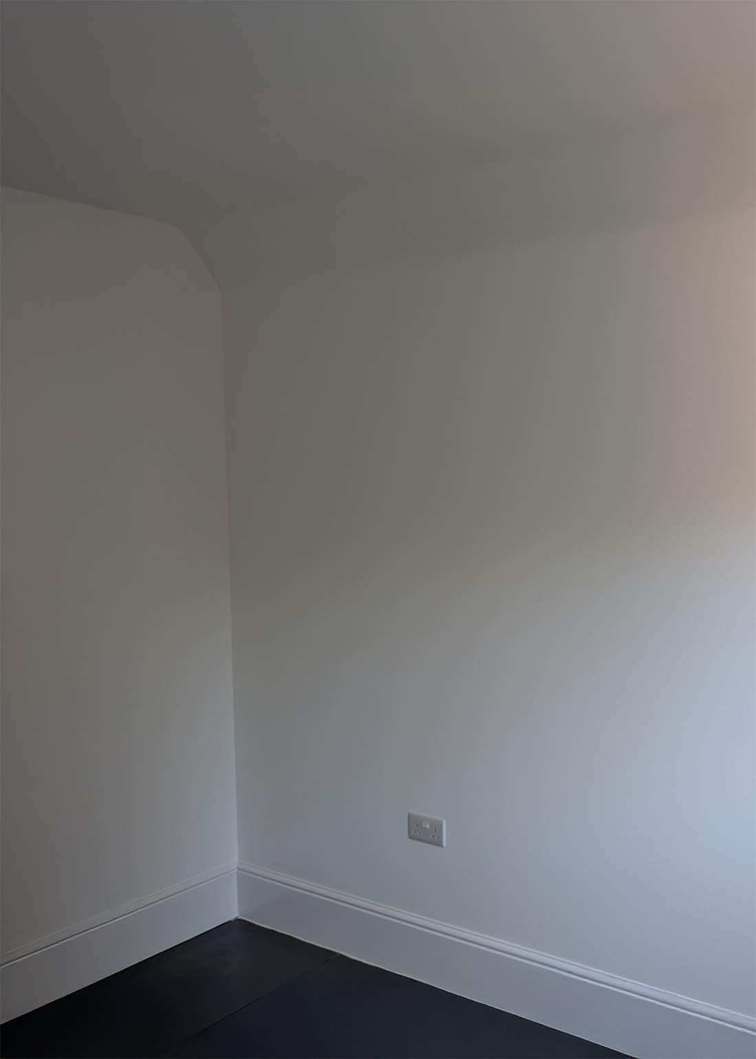 A new build home office with bare white walls