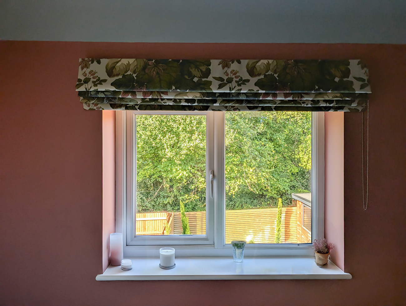 A new build home office with floral blind