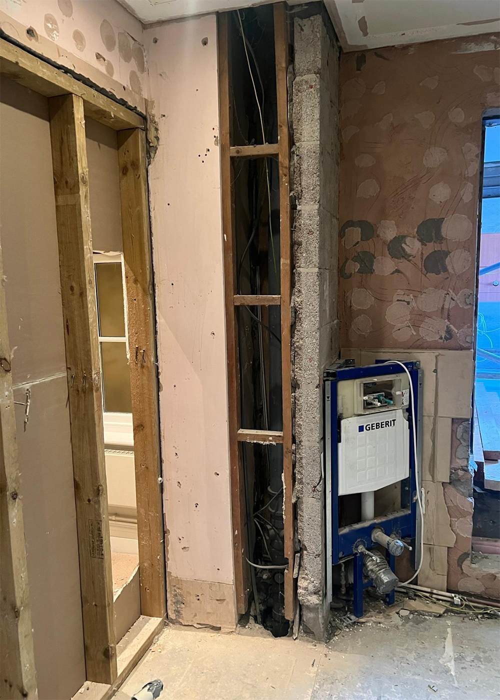 A photo mid demolition of the dressing room being built.