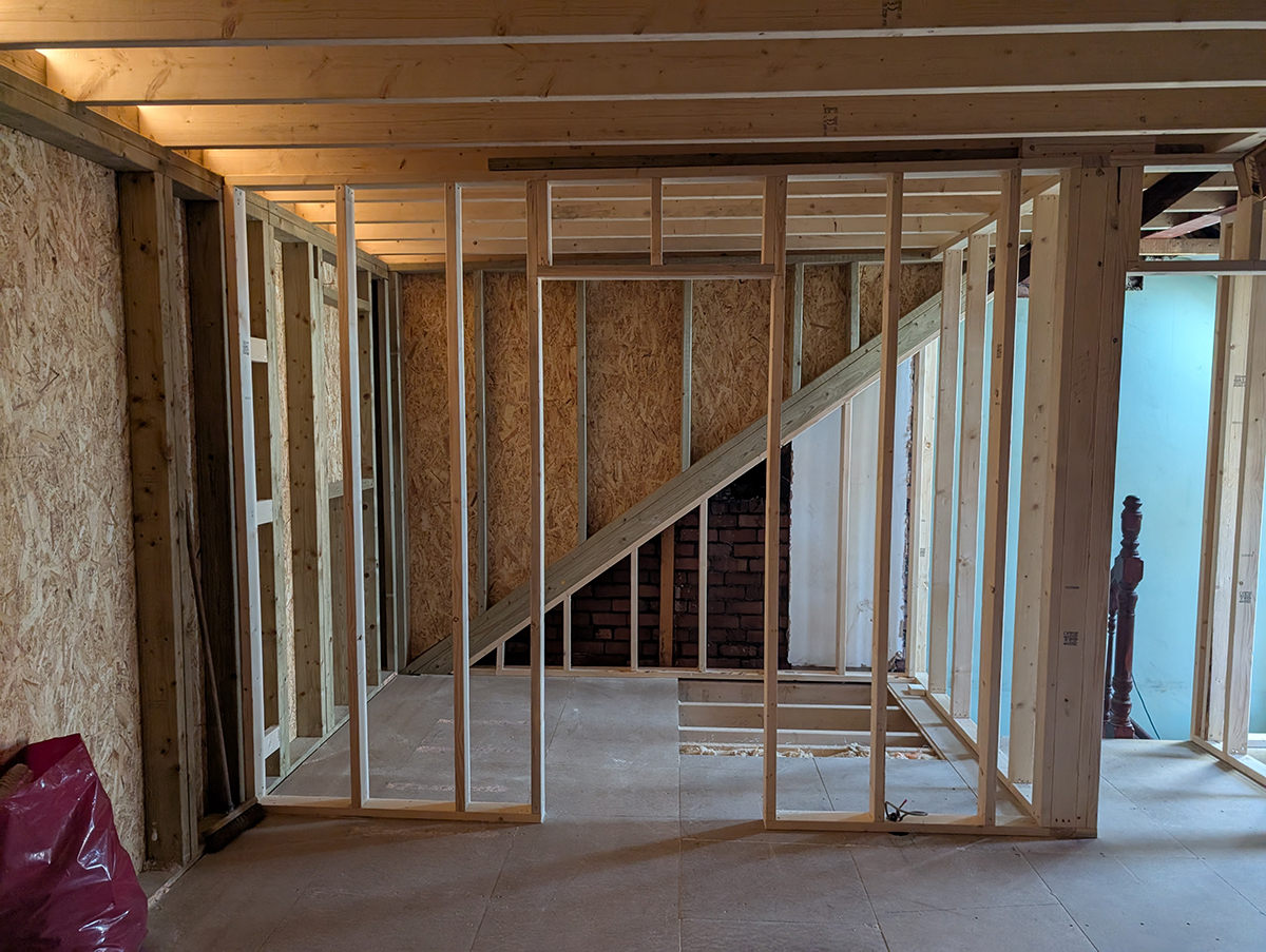A photo showing the studwork for the new en suite.