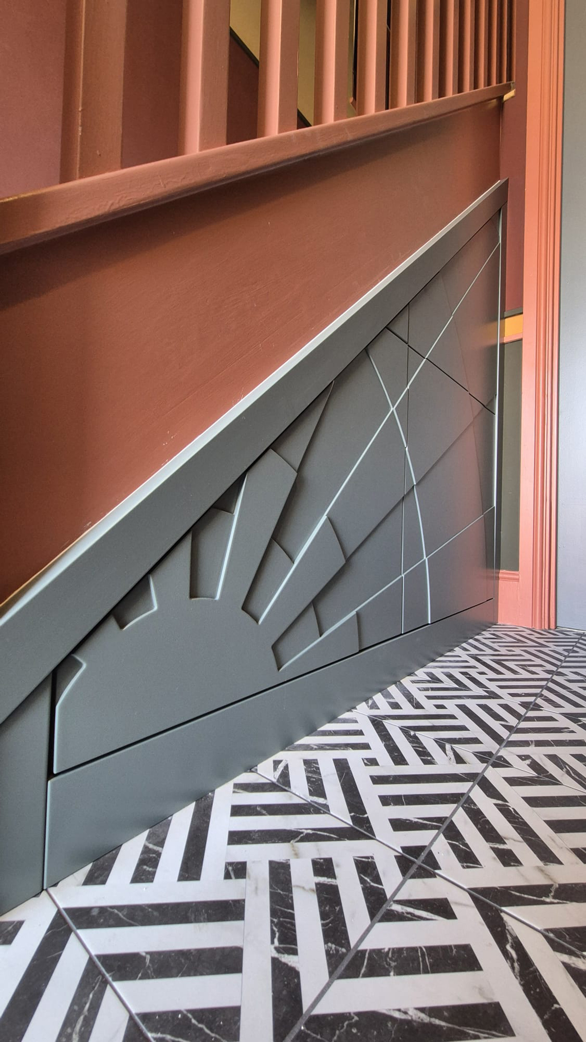 A close up photo of some understair storage from our new build project.