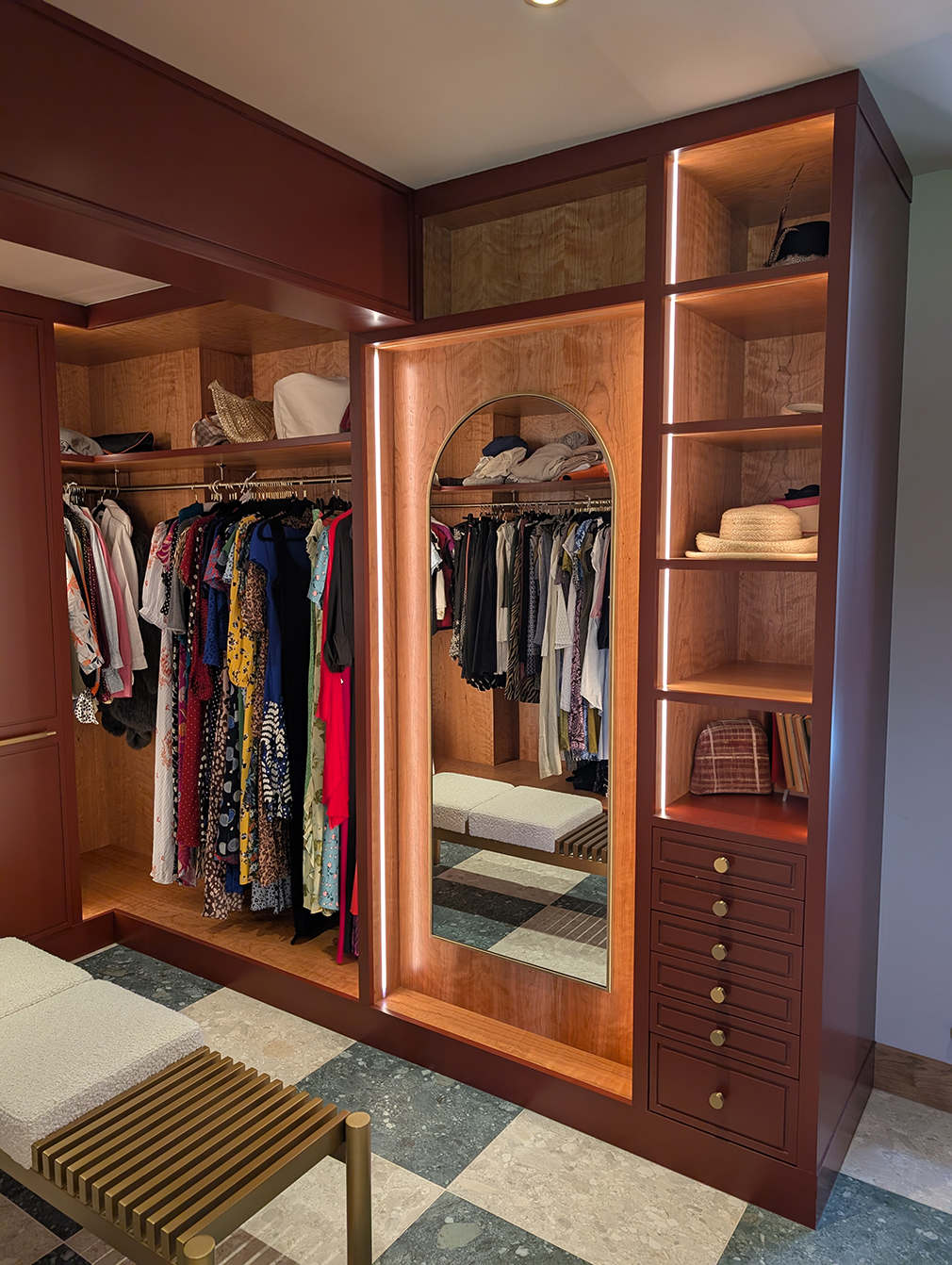A photo of the dressing room with hanging rails which go into the corners.