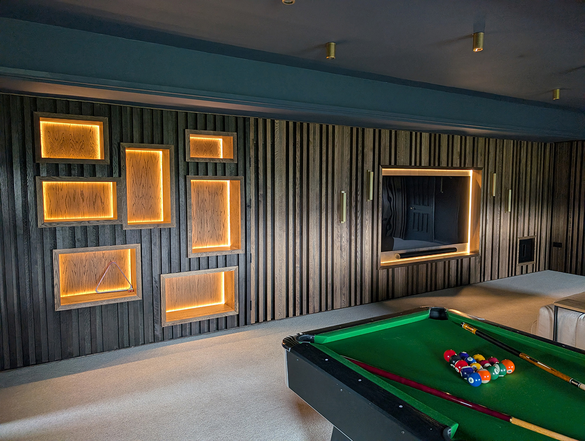A photo of the LED lighting around the display nooks in the media wall.