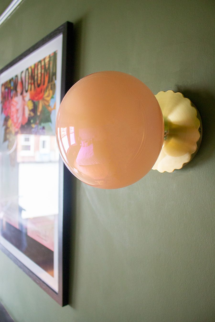 A close up of one of the new peach wall lights.