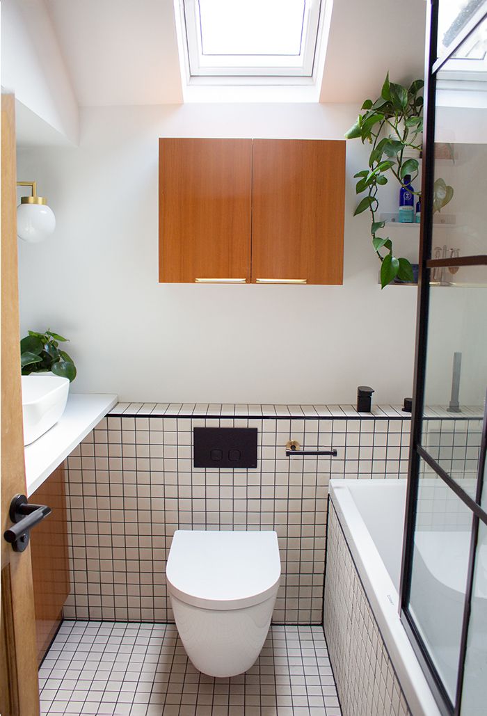 A photo of the bathroom looking through the door to see the whole room.