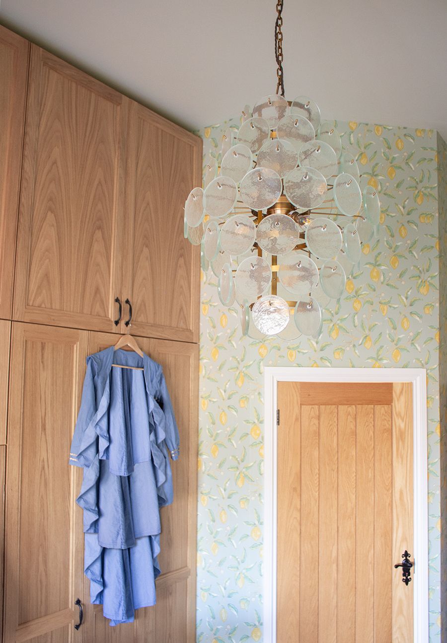 A photo of the sewing room recycled glass pendant light.