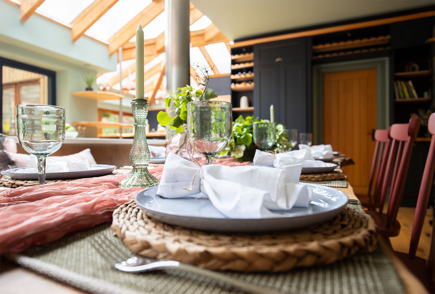 A close up photo of the dining table with a relaxed table setting.