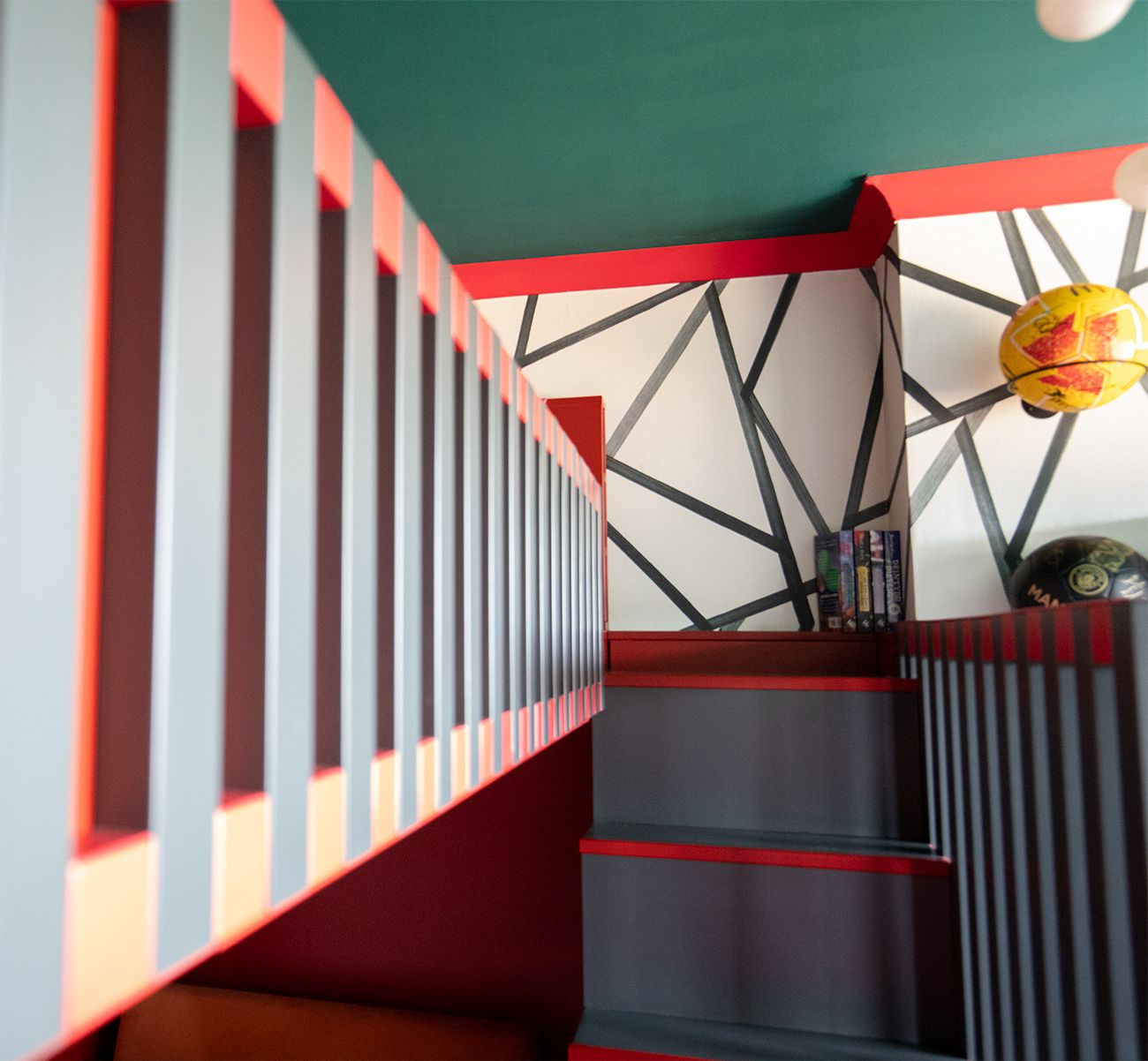 A close up photo looking down the length of the cabin bed, showing the wooden slats along the side.