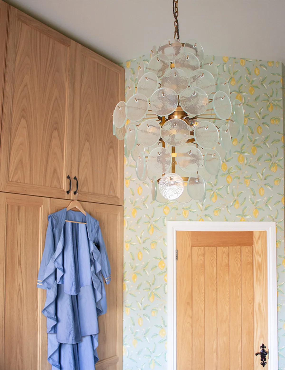 A photo of the sewing room recycled glass pendant light.